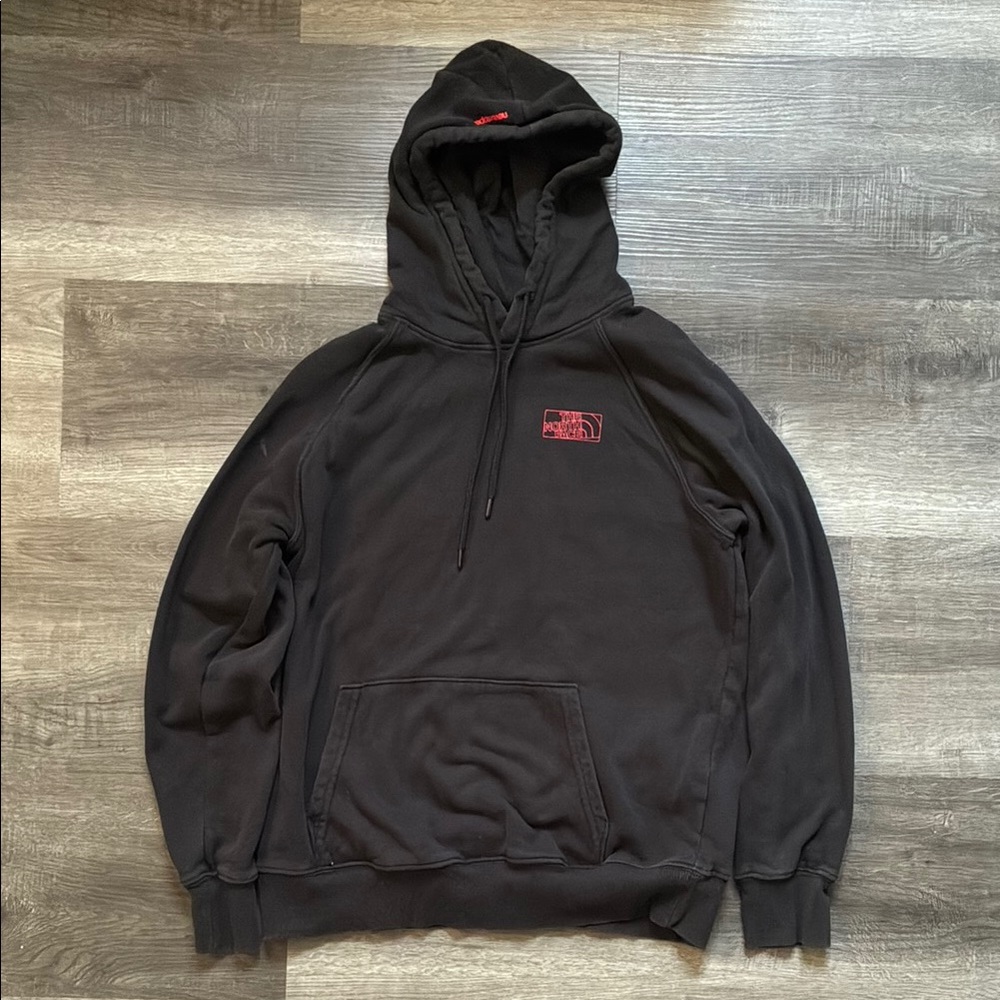 The North Face Black Hoodie with Red Emblem